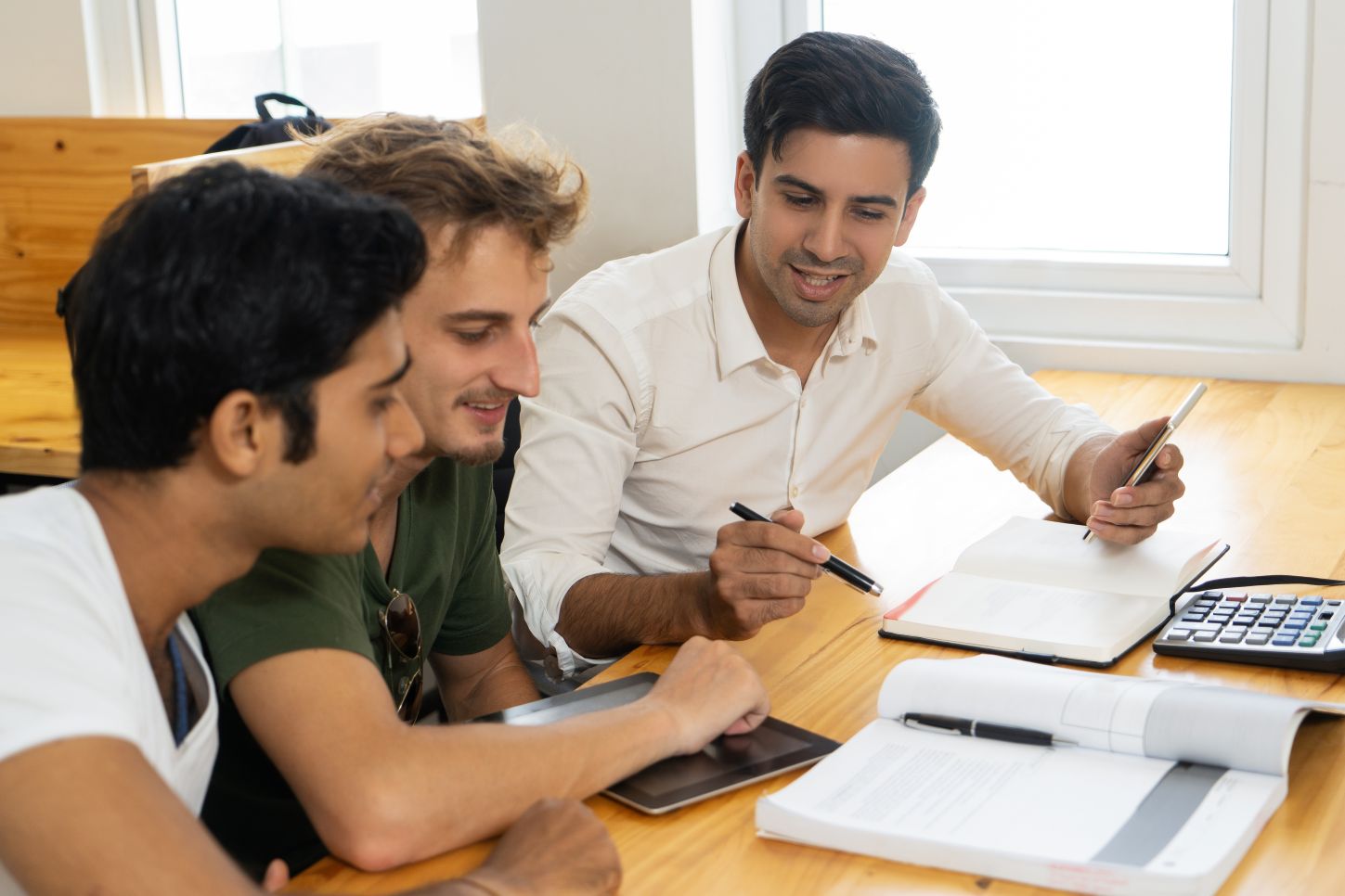 Diverse professionals collaborating in a modern office