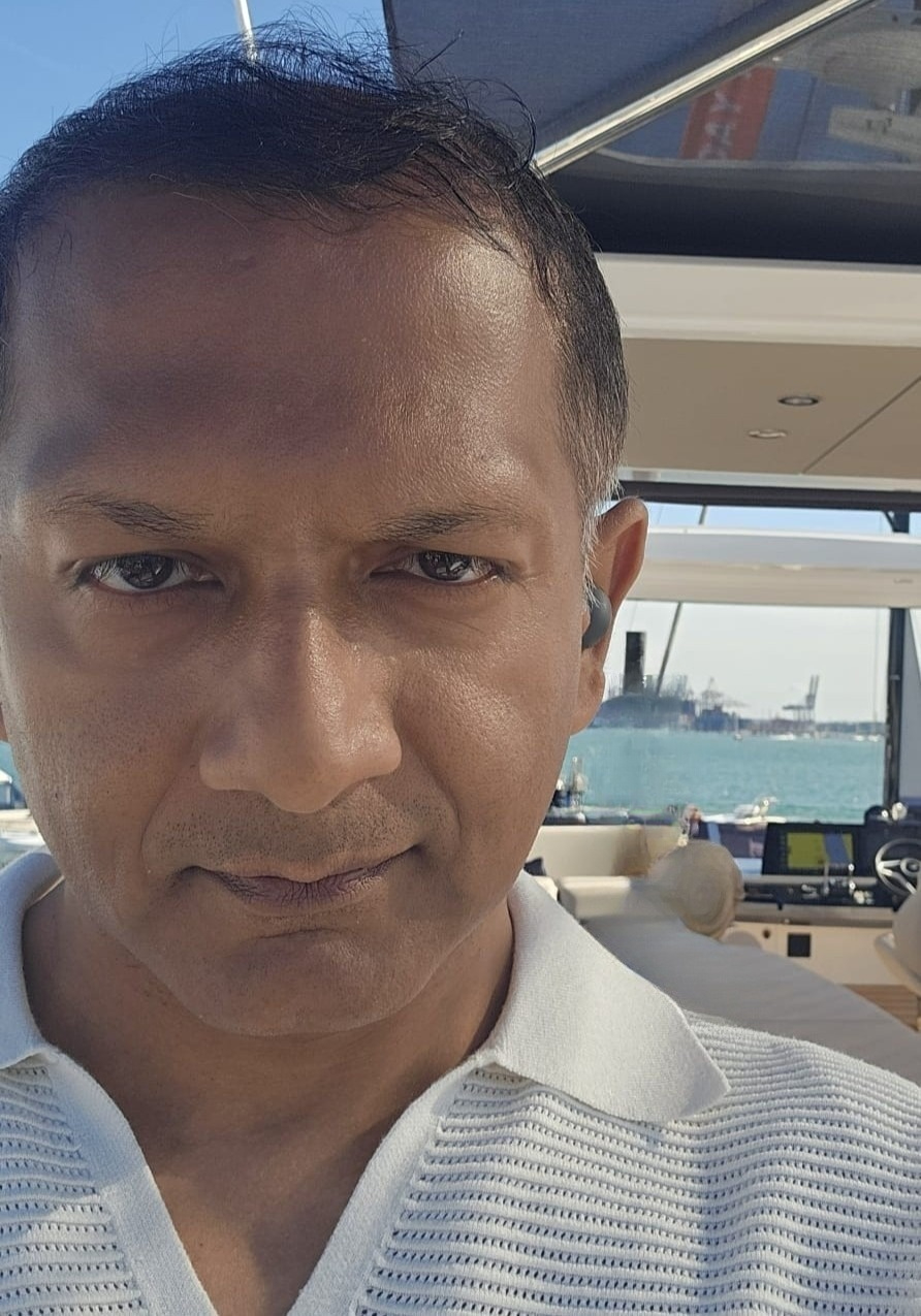 Professional headshot of the author, Rasel Khan